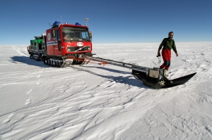 Radar mounted in front of tracked vehicle in Antarctica.